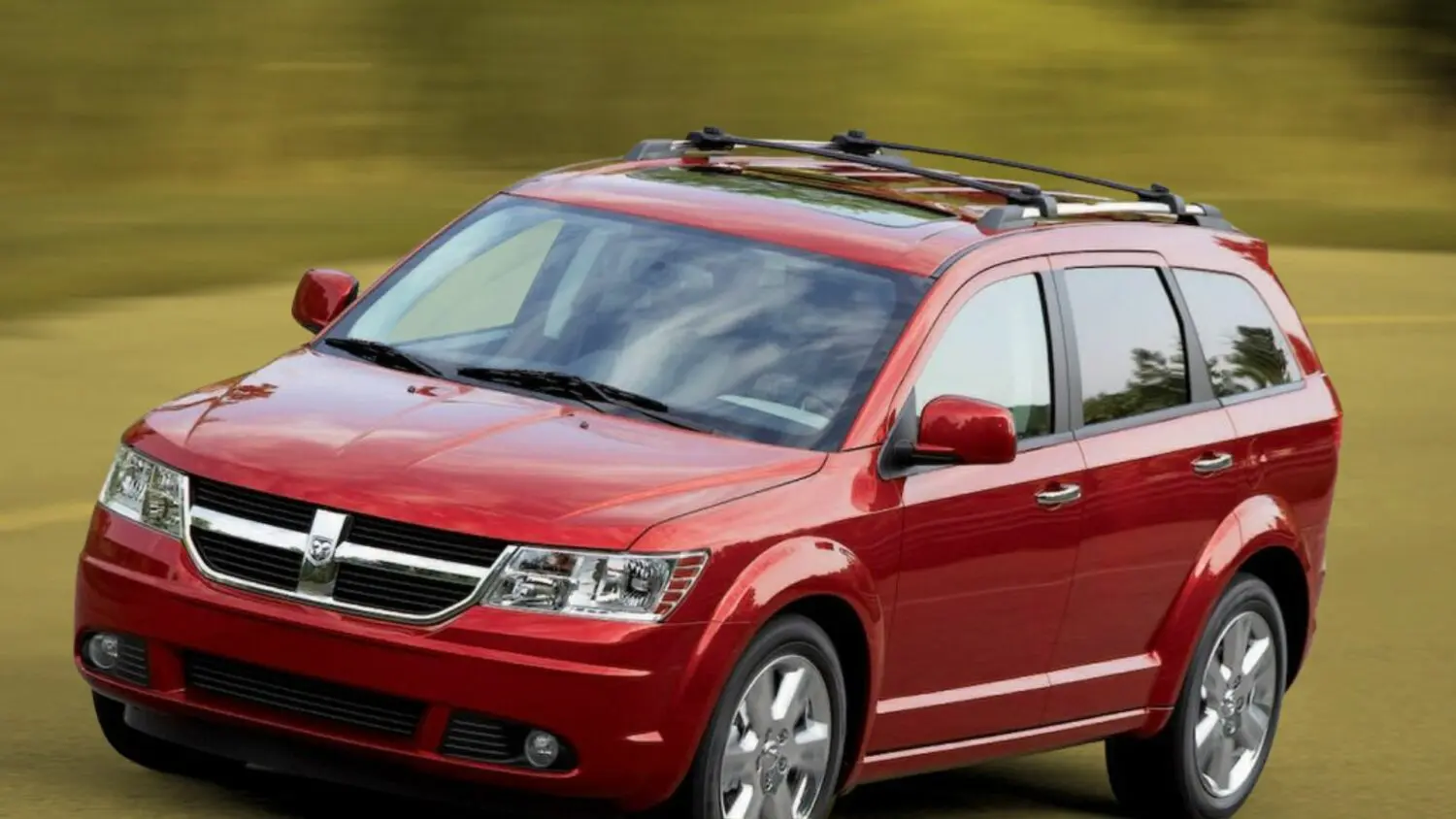 After a woman died inside her SUV in December, U.S. safety regulators are investigating possible electrical issues in older Dodge Journeys.