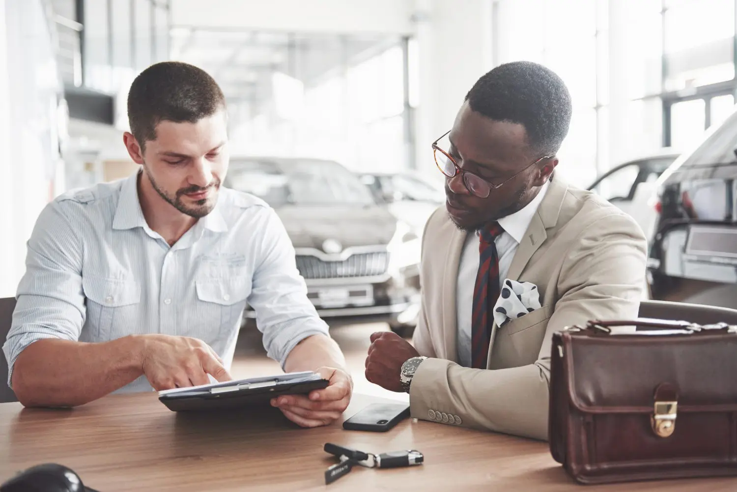 At risk of stating the obvious, an automobile dealership earns its net income in the gap between revenue and operational expenses.