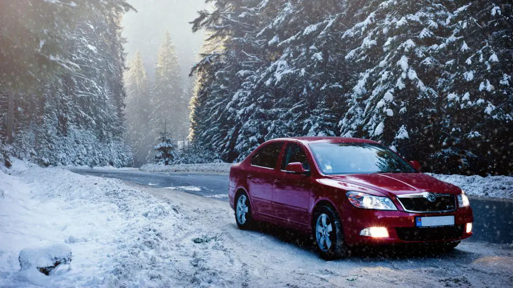 Record 122 million Americans expected to travel this holiday, mostly by car, as gas prices fall below $3 and airfares rise.