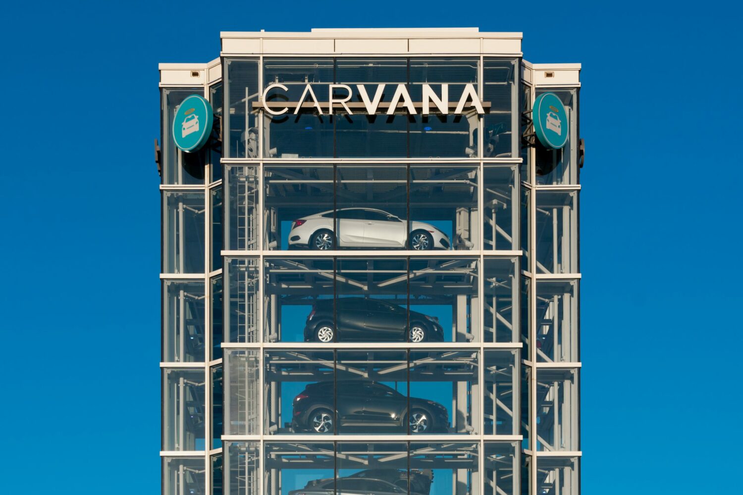 Carvana debt issues Apple car update Uber robo taxi