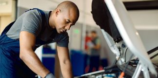 Everything you need to know about the technician skills gap for EVs Automotive technician grapples with new EV technology