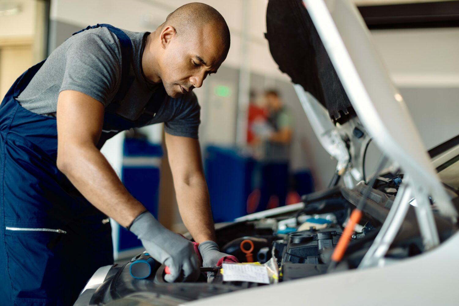 Automotive technician grapples with new EV technology