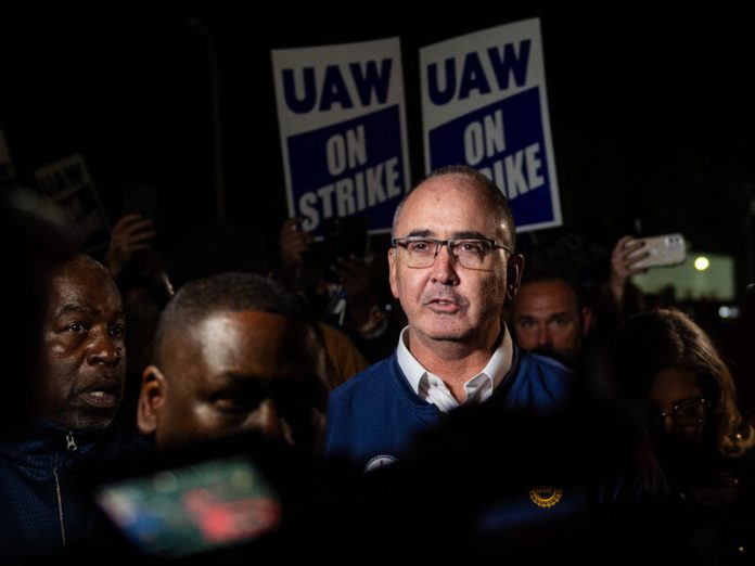 United Auto Workers president Shawn Fain noted that talks with Detroit-Three automakers were progressing slowly, despite an ongoing strike.