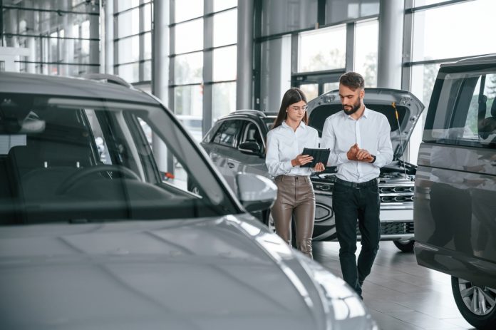 New vehicle sales are expected to rise in October, despite ongoing manufacturing disruptions and economic instability.