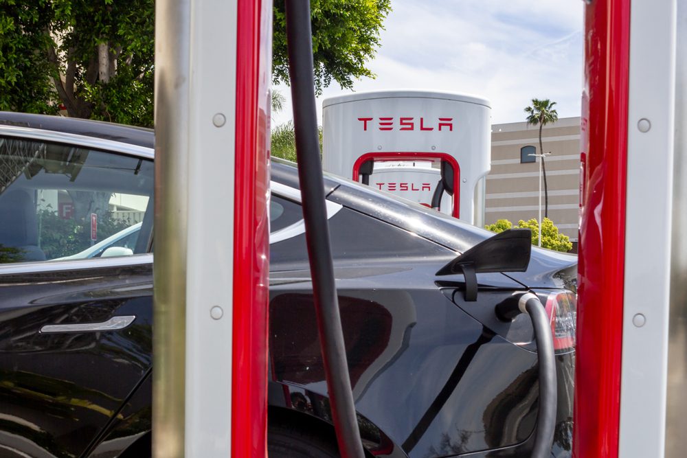 Tesla is implementing a "congestion fee" at select Supercharger locations in an effort to combat long wait times amidst rising demand.