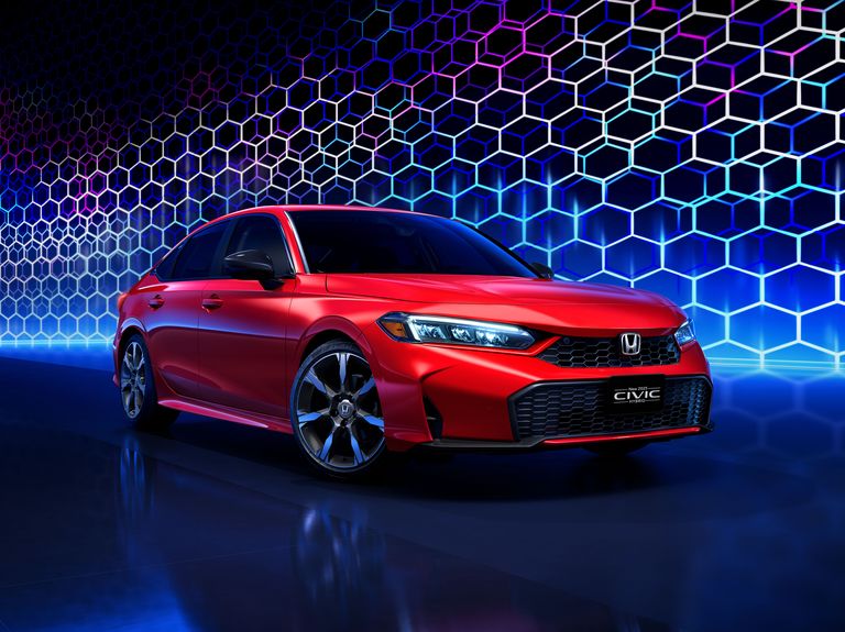 Honda teased images of the upcoming 2025 Civic, unveiling a new hybrid powertrain and a refreshed, performance-focused aesthetic.