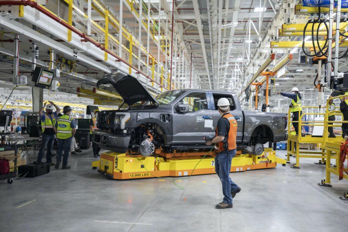 Starting April 1, one third of Dearborn's Rouge EV Plant's workers will remain on-site due to slower F-150 Lightning demand.