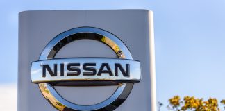 Nissan cuts profit forecast but still expects to beat prior year by wide margin Nissan has lowered its profit forecast due to a variety of factors ranging from shipping delays to increased competition in the U.S.