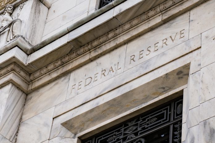 Federal Reserve holds interest rates steady, impacting auto loans and dealer sentiment