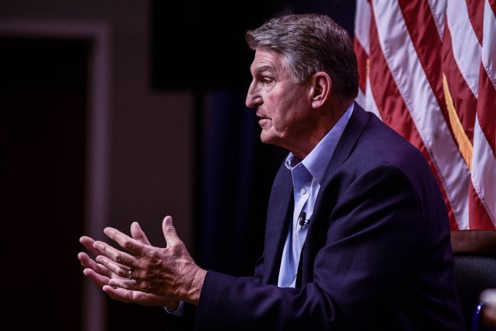 U.S. Senator Joe Manchin is calling on American manufacturers to sue the Treasury Department over its implementation of local content rules.