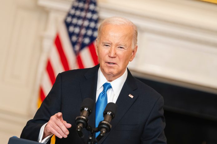 A recent U.S. Supreme Court ruling limiting federal regulatory powers could hinder President Biden's initiative to reduce tailpipe emissions.