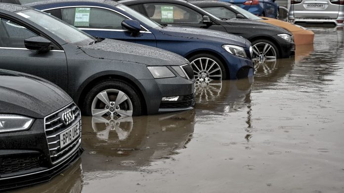 Automobile dealers in Florida are evaluating the disruptions caused by Tropical Storm Debby, which made landfall as a Category 1 hurricane