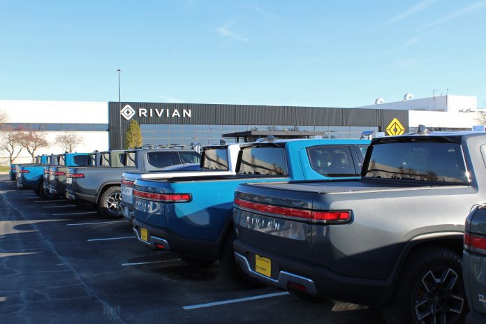 A fire late Saturday night damaged more than 50 R1S and R1T models in the parking lot of Rivian’s EV factory in Normal, Illinois.