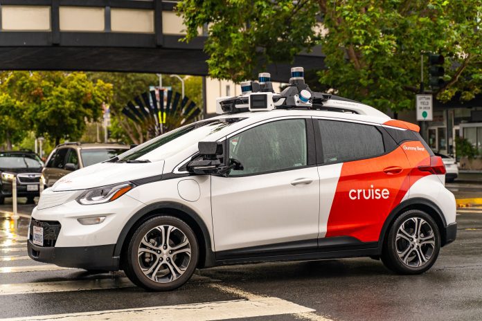 Cruise will begin offering its driverless vehicles on Uber's ride-hailing platform starting next year as part of a multi-year partnership