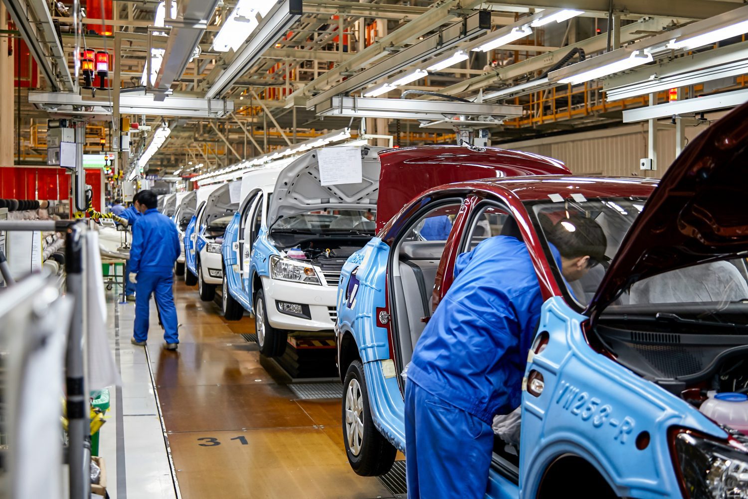Volkswagen considers plant closures and ends job protection pledge amid  industry pressures