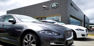 Jaguar Land Rover (JLR) reevaluates profit forecast as new U.S. tariffs raise uncertainty despite reporting strong financial results.