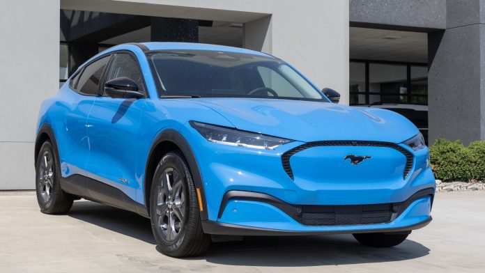 Ford recalls 315,911 Mustang Mach-Es and halts sales over a 12V battery flaw that could trap passengers inside the vehicle.