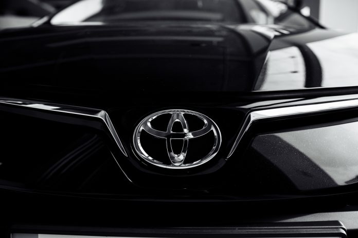 Toyota reported a drop in operating profit for the June quarter, driven largely by U.S. tariffs on imported vehicles and currency fluctuations