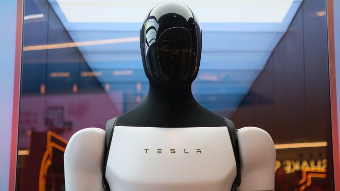 Tesla CEO Elon Musk predicts Optimus robots will drive most of Tesla’s value as automotive sales slow and skeptics question the plan.