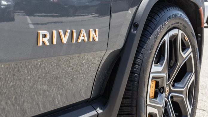 Rivian is recalling 24,214 R1S and R1T EVs in the U.S. and Canada because of a software defect, NHTSA said Friday.