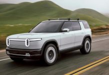Rivian will redesign rear doors on its R2 SUV to improve manual release visibility and meet safety standards before 2026 deliveries.