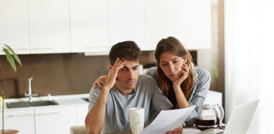 Subprime auto loan delinquencies hit record highs as lower-income Americans struggle with rising car costs and tighter budgets.