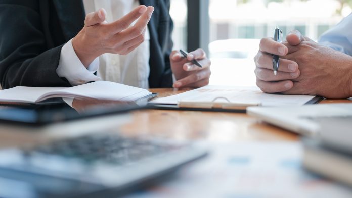 October Dealertrack Index shows looser auto credit with longer terms, lower down payments, and more subprime lending.